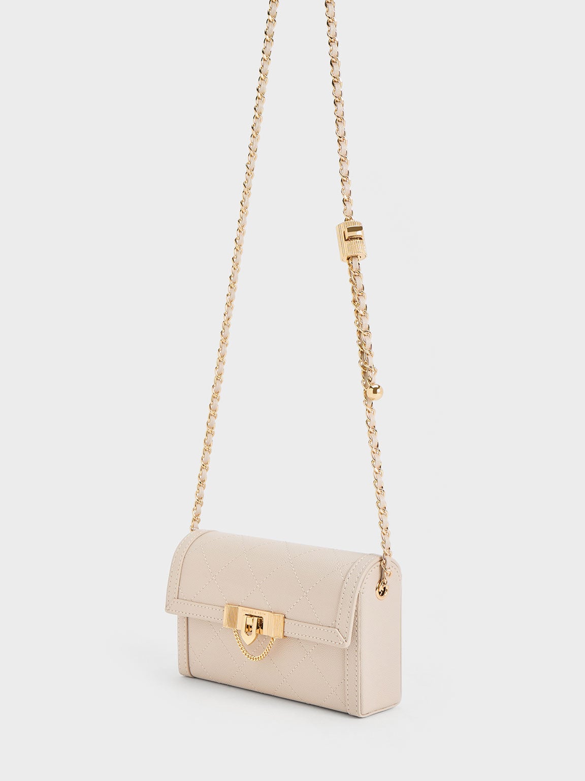 CHARLES & KEITH Recommended | Tallulah Quilted Push-Lock Clutch - Oat