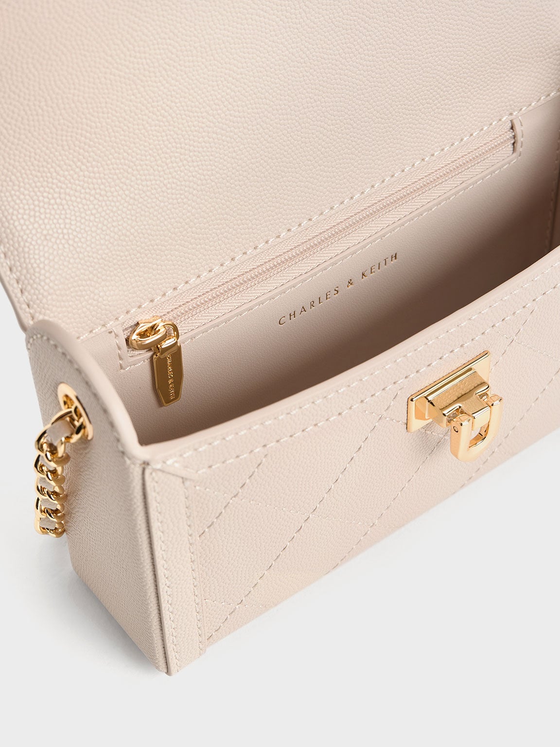 CHARLES & KEITH Recommended | Tallulah Quilted Push-Lock Clutch - Oat