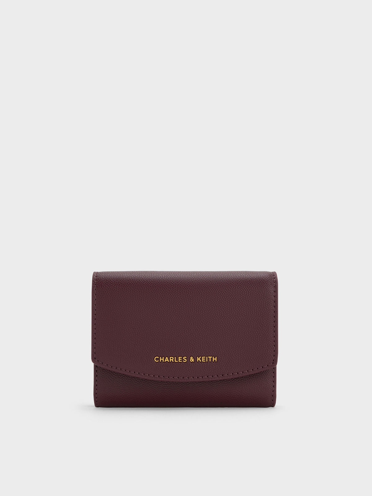 CHARLES & KEITH Deals | Briony Curved Flap Wallet - Wineberry Red