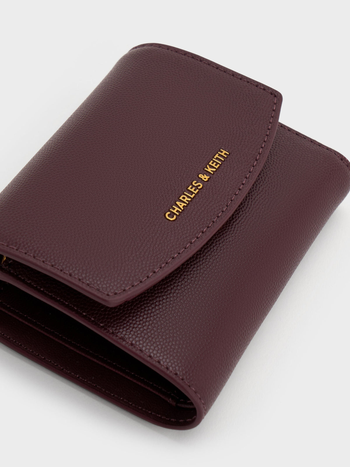 CHARLES & KEITH Deals | Briony Curved Flap Wallet - Wineberry Red