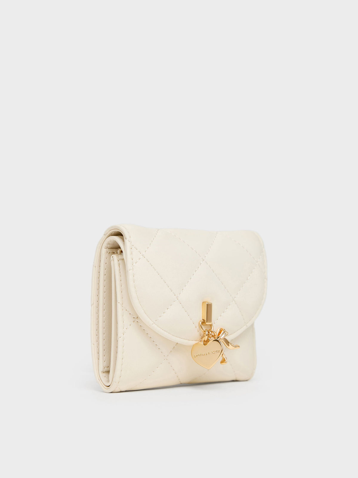 CHARLES & KEITH Classic | Arrietty Quilted Curved-Flap Wallet - Cream