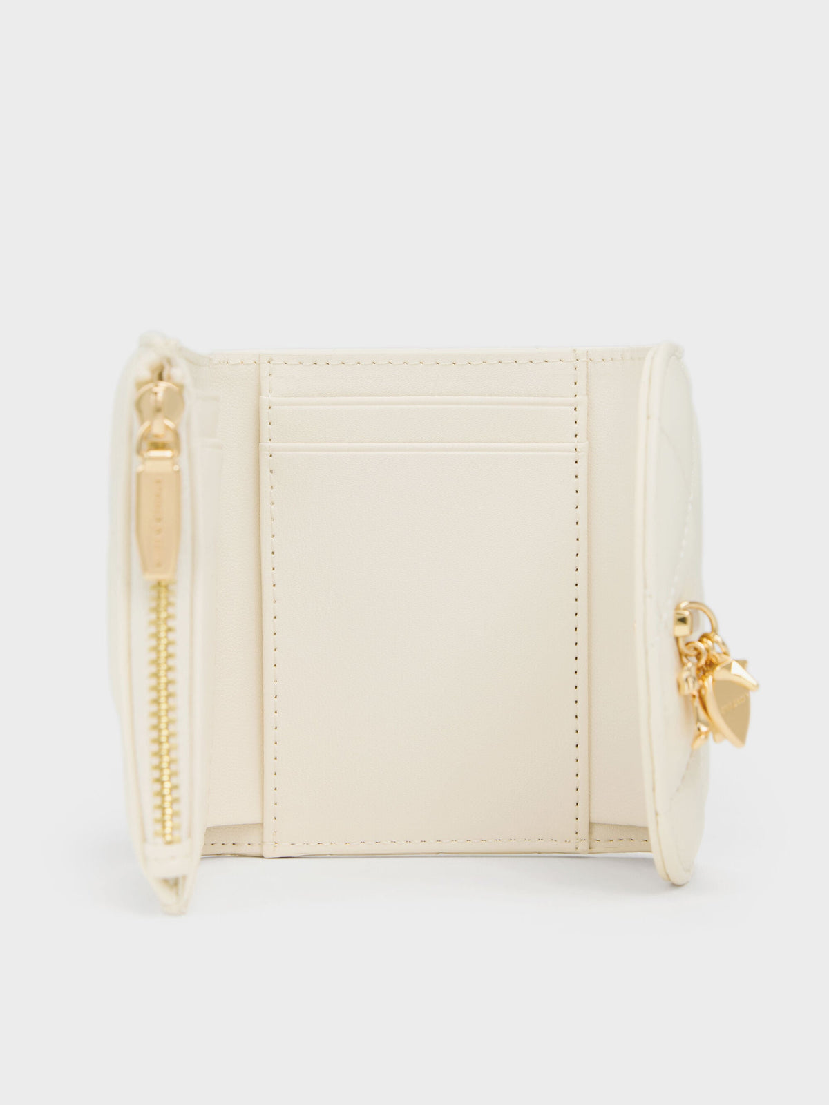 CHARLES & KEITH Classic | Arrietty Quilted Curved-Flap Wallet - Cream