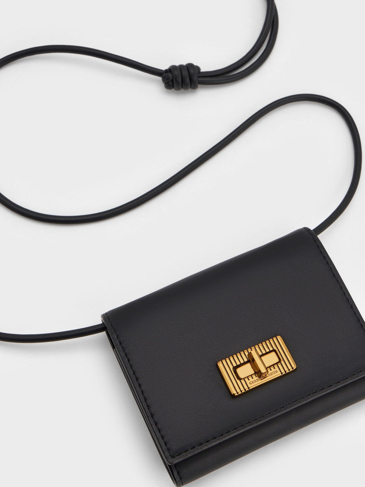 CHARLES & KEITH Latest | Edna Turn-Lock Knotted-Strap Wallet - Black