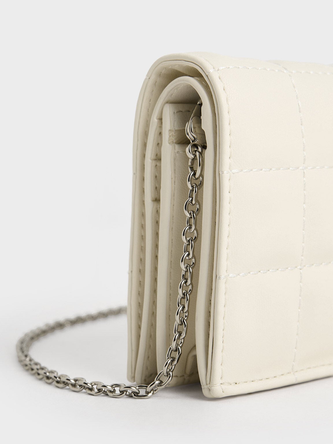 CHARLES & KEITH Recommended | Cassia Quilted Wallet On Chain - Cream