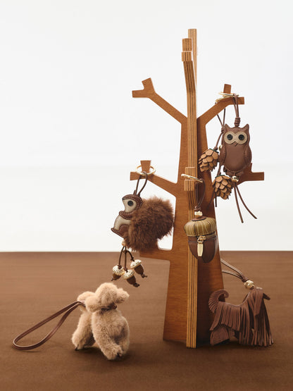CHARLES & KEITH Customer Favorite | Leather Fringed Dog Charm - Chocolate