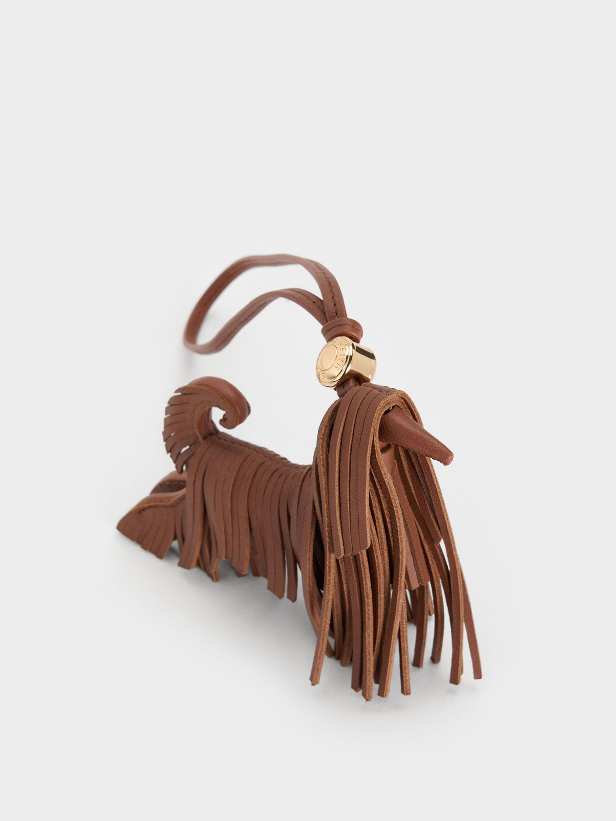 CHARLES & KEITH Customer Favorite | Leather Fringed Dog Charm - Chocolate
