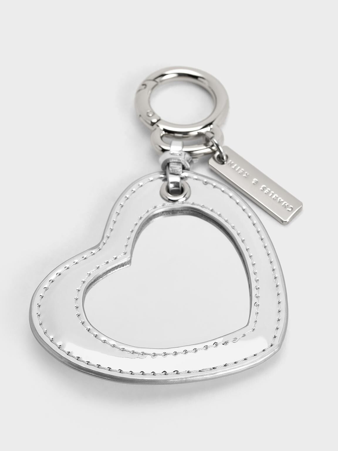 CHARLES & KEITH Best Seller | Metallic Heart Quilted Mirror Charm - Silver
